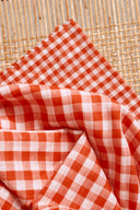 Tissu vichy double gaze coton orange vif au mètre – doux et classique – Atelier Brunette