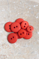 Another close-up of the buttons on the marbled beige stone, from a different angle.