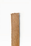 Élastique en raphia de 4 cm de large, souple et pratique, idéal pour la confection de vêtements, accessoires et créations textiles.