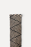 Élastique en raphia bicolore de 5 cm de large, alliant souplesse et maintien. 