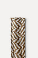 Élastique en raphia bicolore de 5 cm de large, alliant souplesse et maintien. 