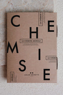 Amirale Shirt pattern – kraft cardboard pattern envelope for the AMIRALE shirt, Atelier Brunette logo, marble background – Atelier Brunette