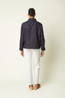 Jacket pattern – back view, jacket indigo denim orange stitching, white jeans – Atelier Brunette