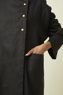 Troublante Jacket pattern – close-up crossed button placket, 3 gold buttons, colourway black – Atelier Brunette