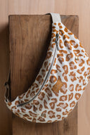 Bum Bag pattern – bum bag fabric leopard print white and caramel, front view wood background – Atelier Brunette
