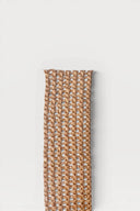 Sangle en raphia naturel tissé de 4 cm de large, souple et pratique, idéale pour la confection de vêtements, accessoires et créations textiles.